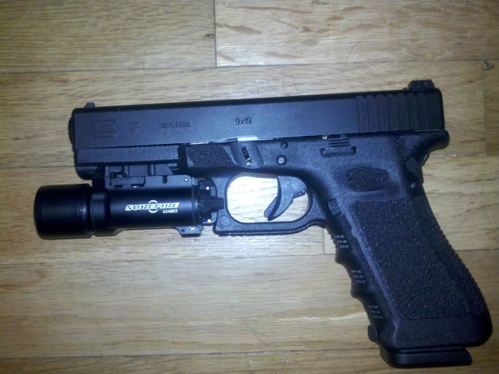 Removing Glock 17 trigger pin.